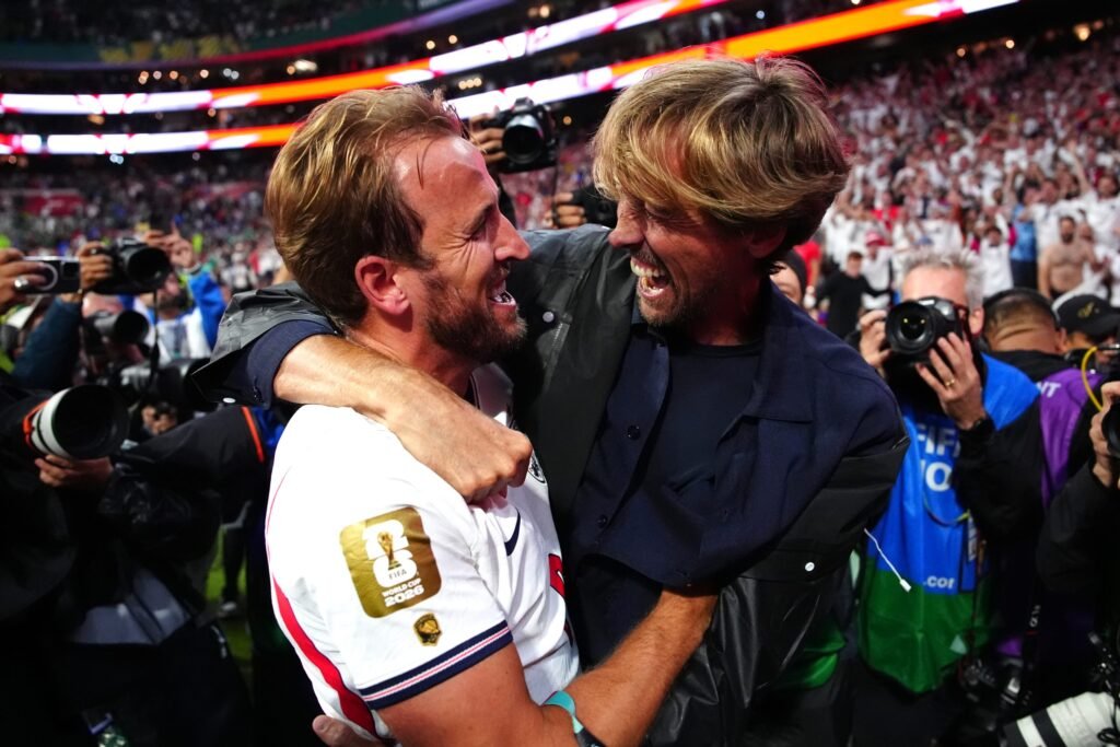 Harry Kane Presents England Legacy Cap To Peter Crouch During Three Lions Camp Visit Harry Kane Presents England Legacy Cap To Peter Crouch During Three Lions Camp Visit