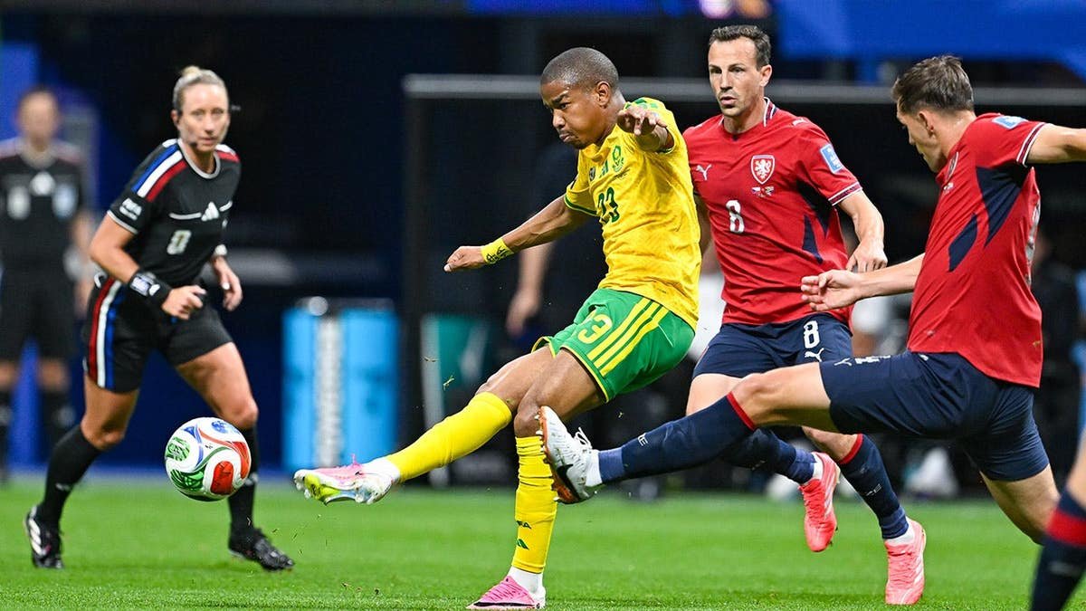 Jayden Adams passes during a soccer match in Atlanta.