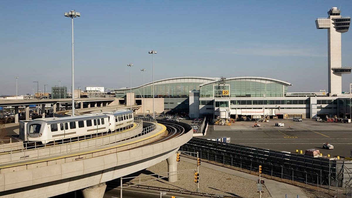 Control tower, terminal and train at Kennedy Airport in New York