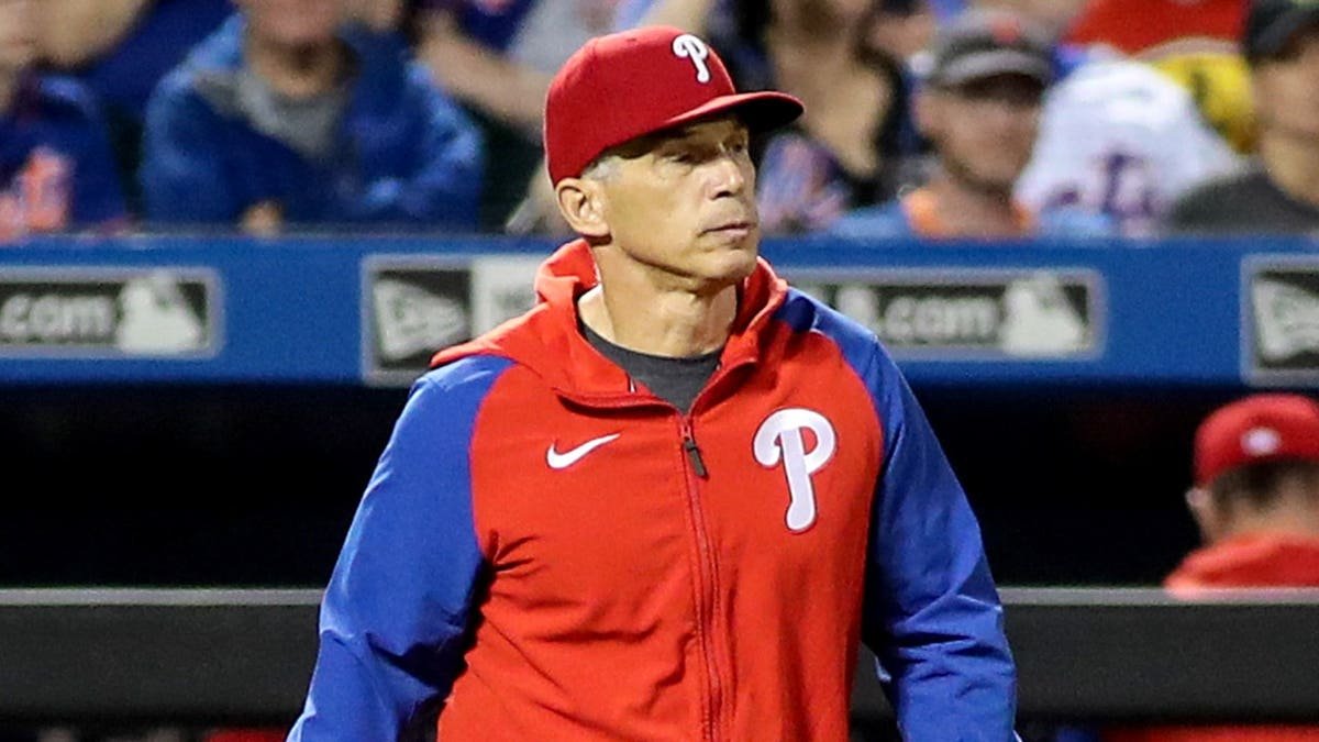 Joe Girardi stands at Citi Field.