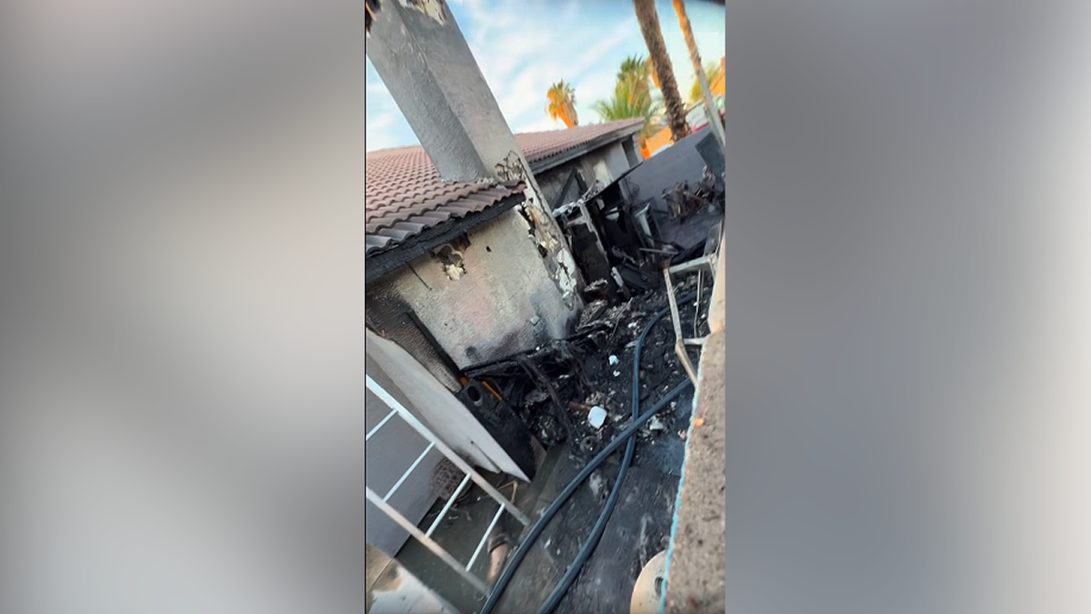 Backyard destroyed after Las Vegas fire spreads between neighboring homes