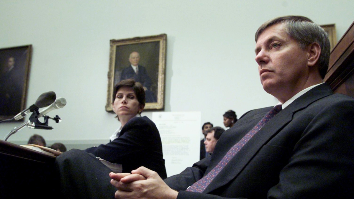 Reps. Mary Bono and Lindsey Graham listen to testimony at the House Judiciary Committee hearings on whether to impeach President Clinton.
