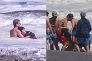 Heart-stopping moment little boy is battered by huge waves and dragged out to sea off California Heart-stopping moment little boy is battered by huge waves and dragged out to sea off California