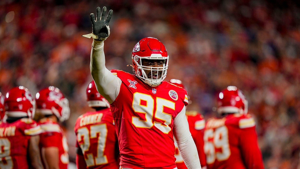 Chris Jones waves to the crowd