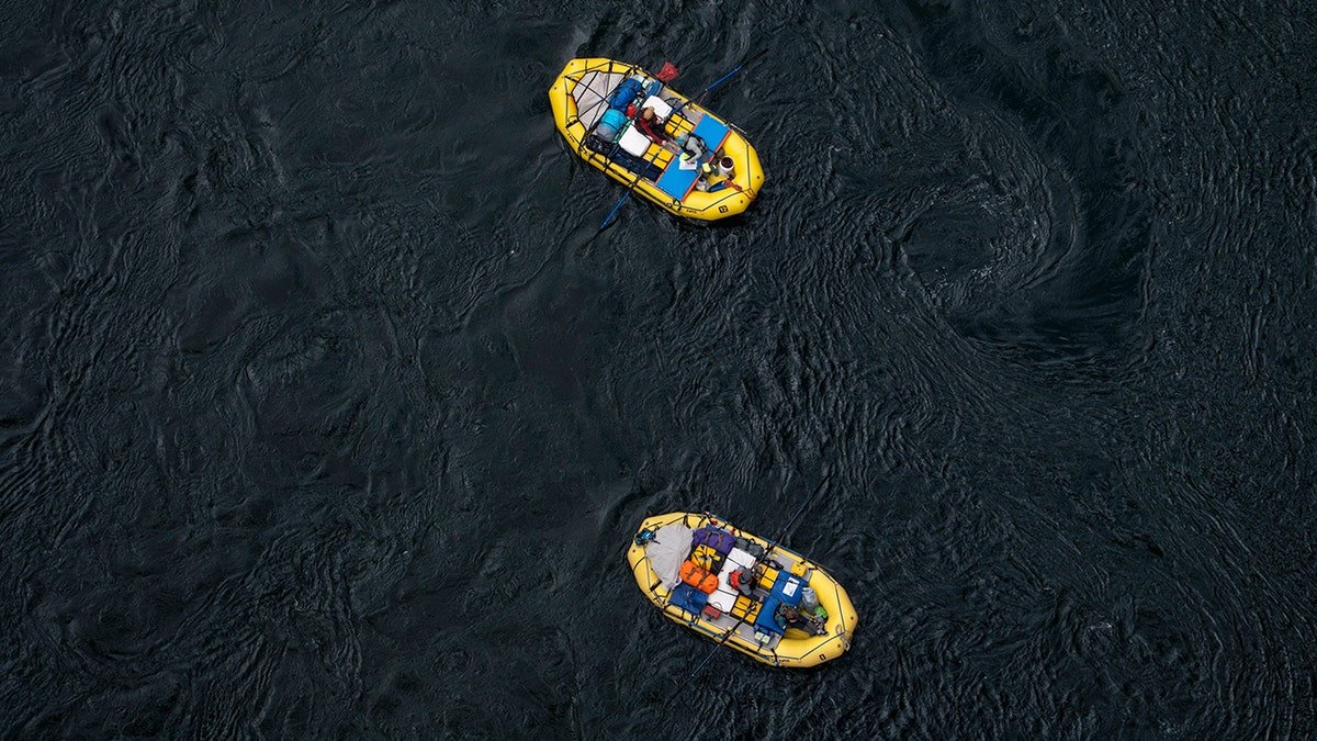 aerial view of two rafters on river