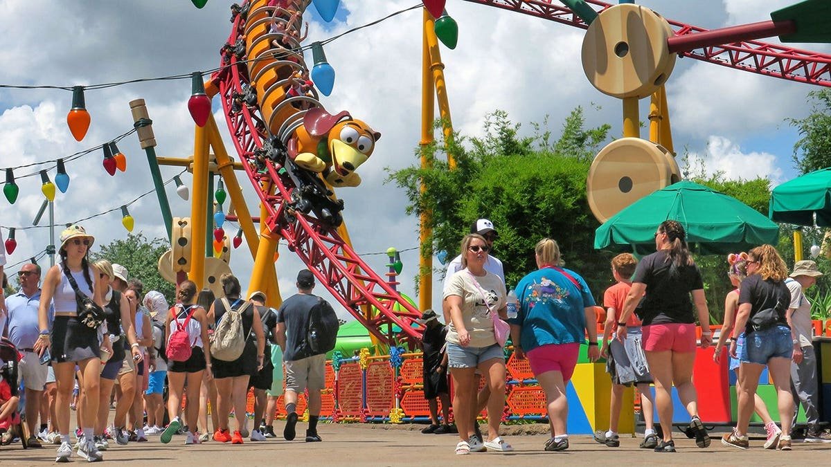 People lining up for the Toy Story Land ride.