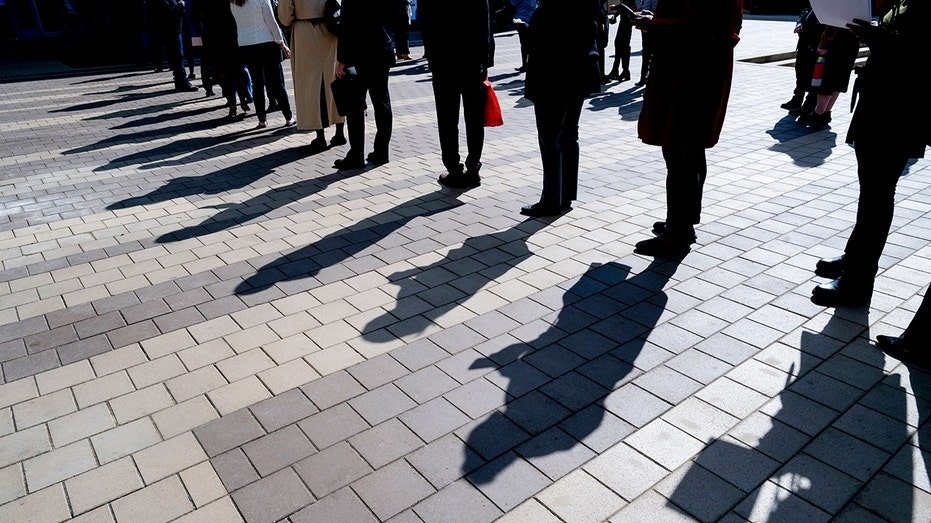 People stand in line