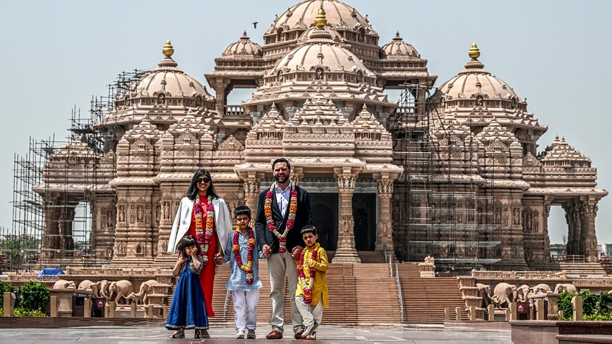 US Vice President JD Vance (2R) and his wife Usha Vance (2L), along with their children