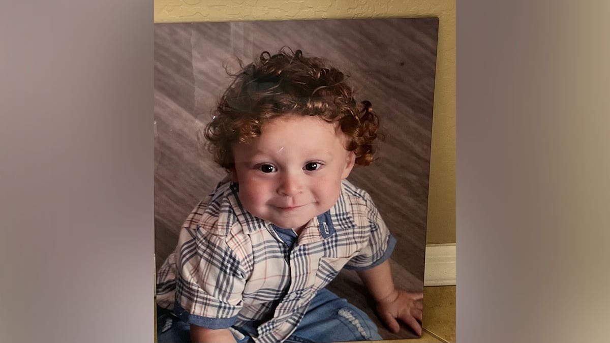 18-month-old Vincent Fiordilino smiling in a family photograph