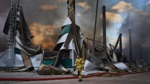 Russian drone strikes hit Ukraine as warehouses burn