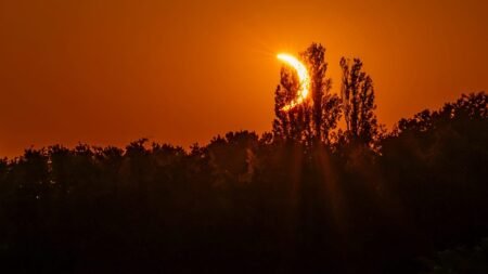 Video. Hikers in awe as solar eclipse turns sky red over French Pyrenees Video. Hikers in awe as solar eclipse turns sky red over French Pyrenees