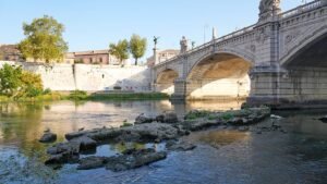 Ancient Roman bridge in the Tiber river exposed due to drought Ancient Roman bridge in the Tiber river exposed due to drought