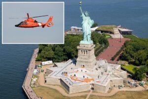 Boat overturns off Liberty Island coast; woman and child in critical condition Boat overturns off Liberty Island coast; woman and child in critical condition