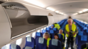 Budget airline Jetstar to charge passengers for storing bags in overhead compartments Budget airline Jetstar to charge passengers for storing bags in overhead compartments