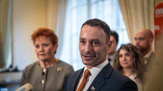 One Nation Victoria leader Warren Pickering with Pauline Hanson at a press conference in Melbourne on Monday. 