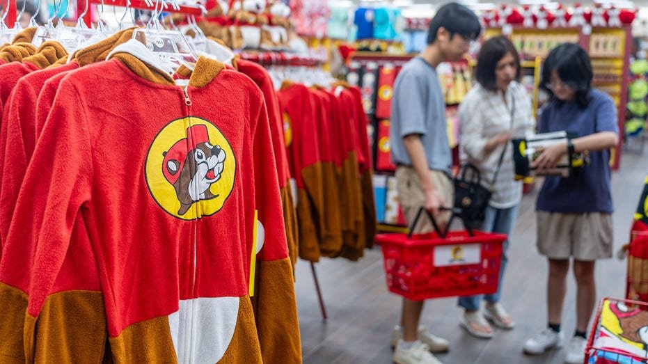 Customers shop for apparel inside of the Buc-ee's convenience store on June 12, 2024 in Luling, Texas.