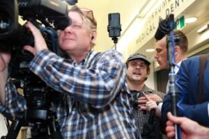 Exclusive Brethren secretly paid far-right activists to perform stunts disrupting the federal election
