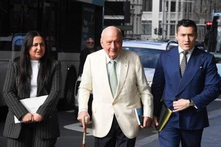 Witness says Jones accuser looked distraught at Sydney lunch Witness says Jones accuser looked distraught at Sydney lunch