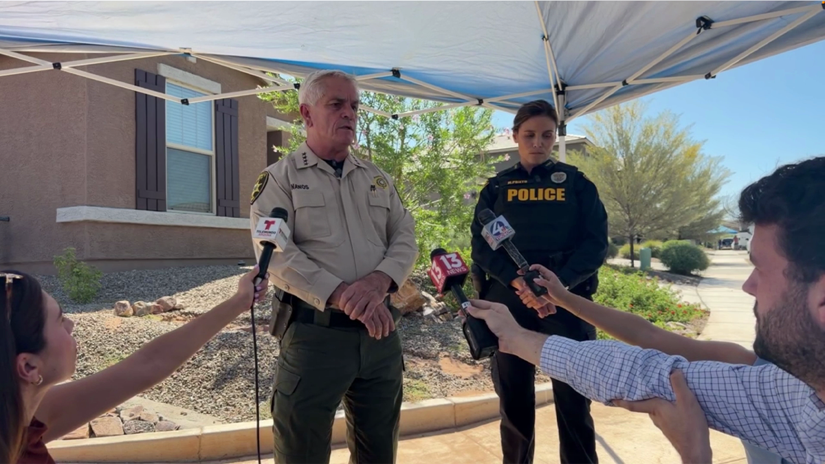 Pima County Sheriff Chris Nanos and Tucson Police Chief Monico Prieto speak with reporters