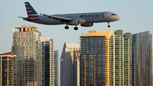 American Airlines flight lands safely after laptop battery catches fire on board; passenger injured