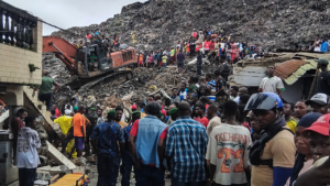 Massive garbage heap collapses onto homes, killing at least 30 as rescuers search for survivors Massive garbage heap collapses onto homes, killing at least 30 as rescuers search for survivors