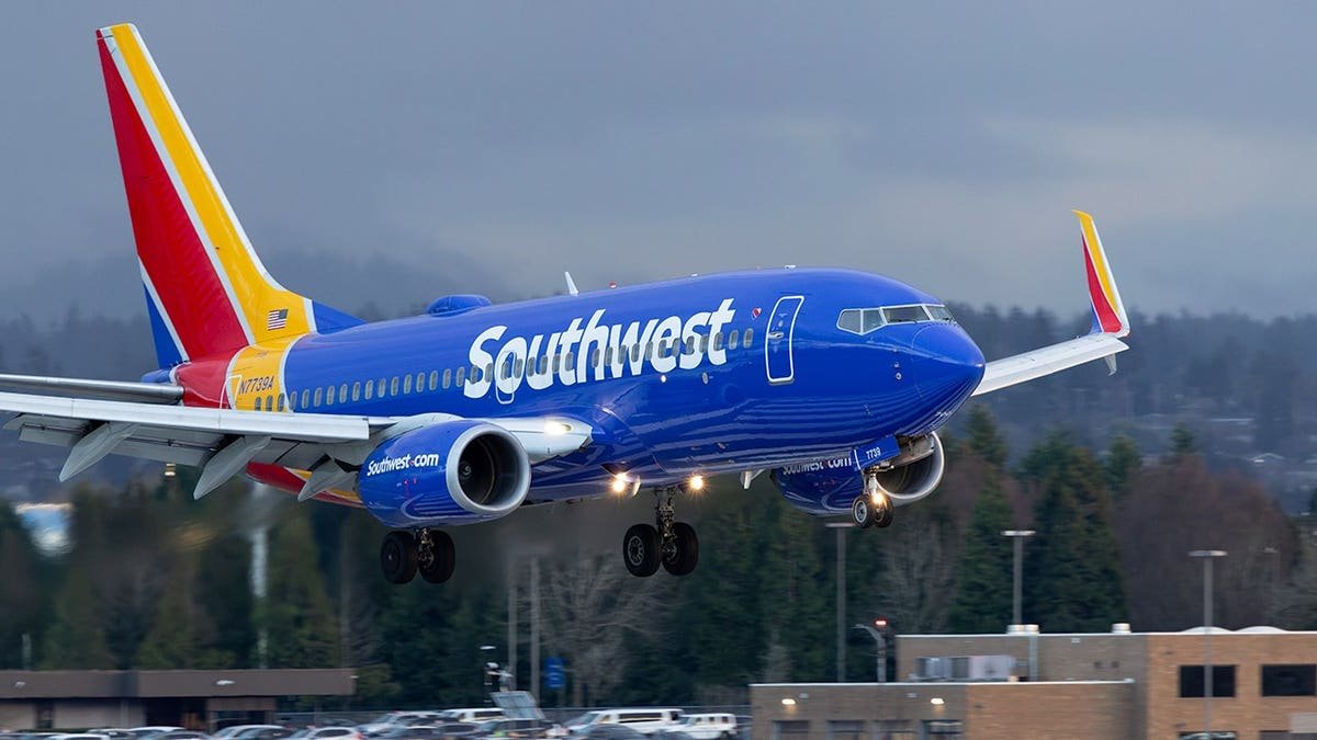 Southwest Airlines flight flying in the air.