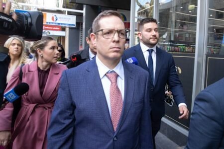 Two Victoria Police officers cleared of negligent manslaughter of builder Luke Briggs