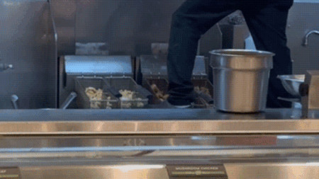 Panda Express guest stunned as employee stands on fryer while cleaning Panda Express guest stunned as employee stands on fryer while cleaning