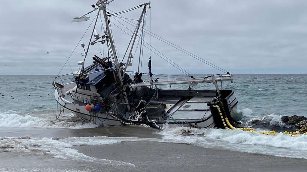 Massive fishing boat runs aground at popular beach with 1,000 gallons of diesel on board Massive fishing boat runs aground at popular beach with 1,000 gallons of diesel on board