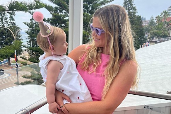 Leah Stewart, pictured with her daughter before she was attacked by a great white shark at Coogee in June.