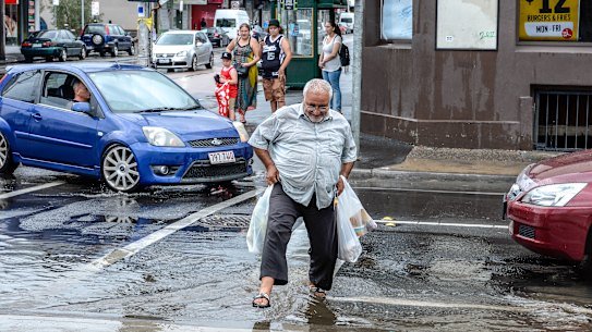 Flash flooding on Sydney Road, Brunswick, in 2017.