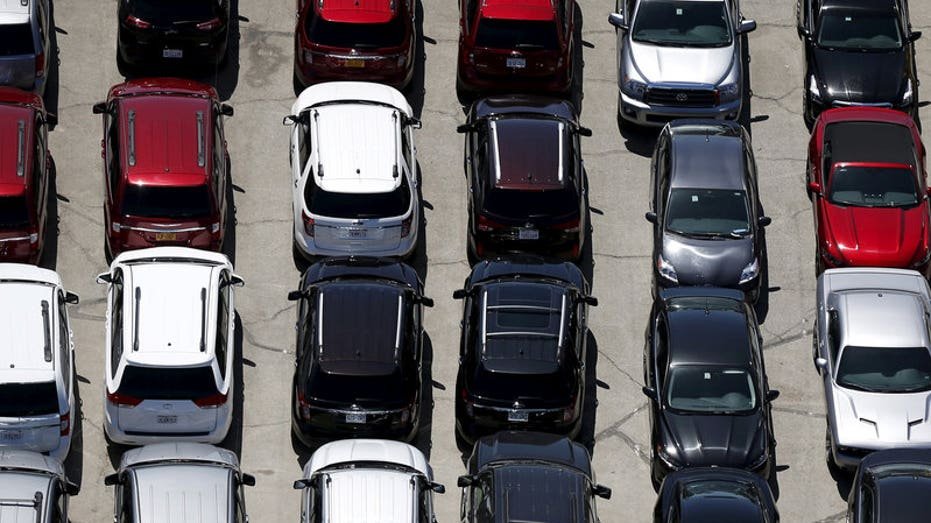 Cars are seen in a parking lot in Palm Springs, California April 13, 2015.