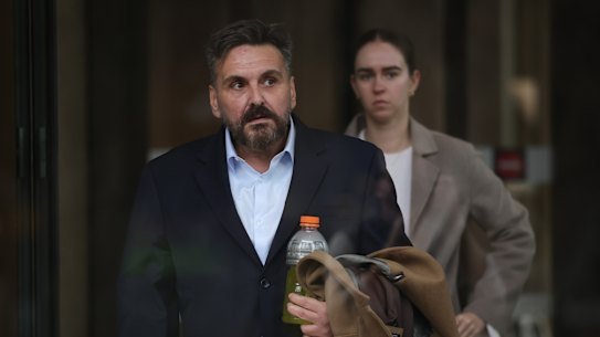 Convicted fraudster George Alex leaves court in Sydney. He was granted bail last year despite a hefty prison sentence.