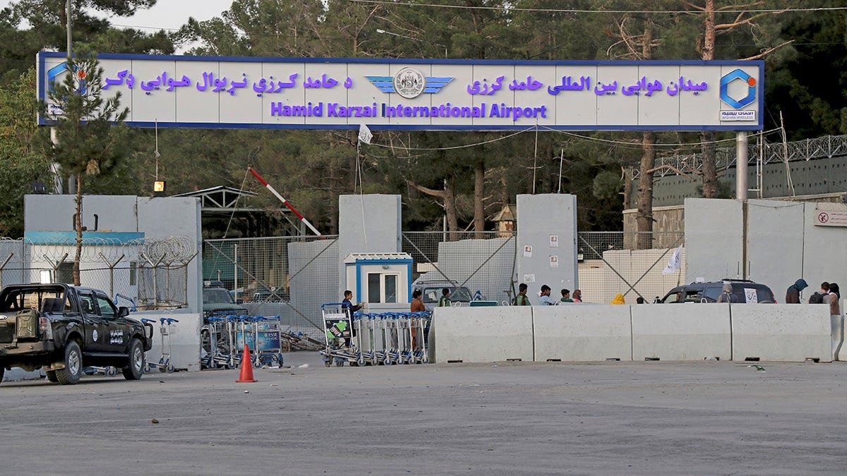 General view of the gate of Hamid Karzai international Airport in Kabul, Afghanistan, Saturday, Aug. 28, 2021. The Taliban have sealed off Kabul’s airport to most would-be evacuees to prevent large crowds from gathering after this week's deadly suicide attack. The massive U.S.-led airlift was winding down Saturday ahead of a U.S. deadline to withdraw from Afghanistan by Tuesday.