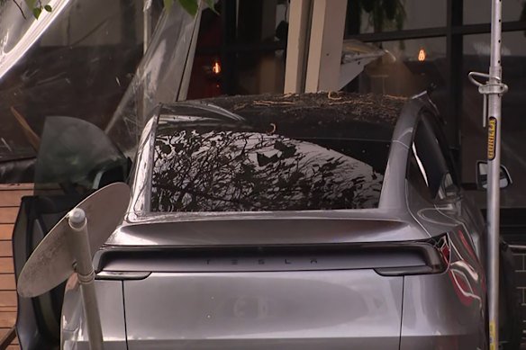 Police are investigating after a car struck a pedestrian and crashed into a café at a shopping centre in Wantirna South on Monday afternoon.