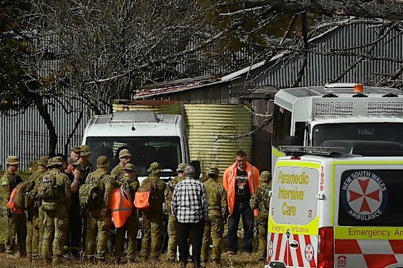 Australian Army personnel who participated in the rescue operation are addressed on Thursday. 