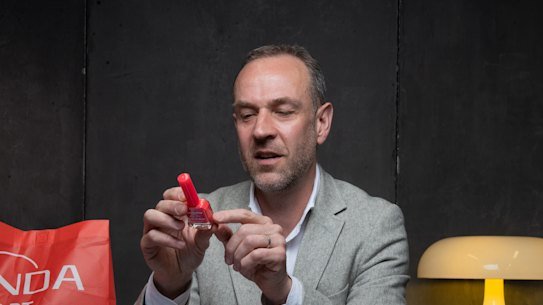 Product safety expert Professor Blair Kuys examines Panda Mart products. 