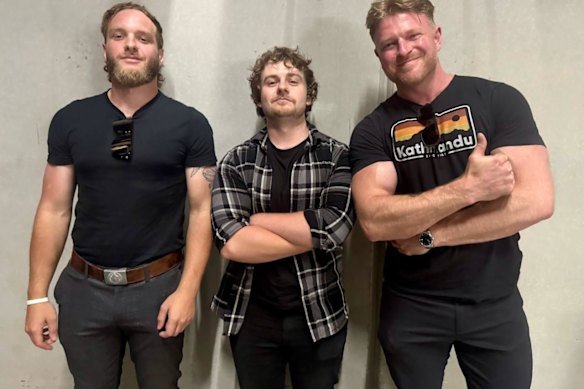 Laurence McIntyre (middle) pictured months before his campaign stunts with neo-Nazis Joel Davis and Blair Cottrell at a white supremacist gathering.