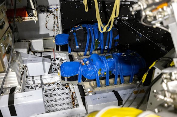 A control dummy (foreground) and a dummy strapped with a 26kg trial “AstroRad” vest in the uncrewed Artemis I Orion spacecraft.