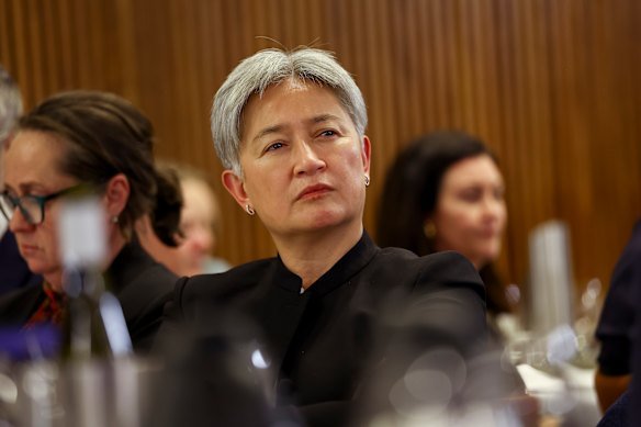 Foreign Minister Penny Wong listens to an address at the National Press Club last month.