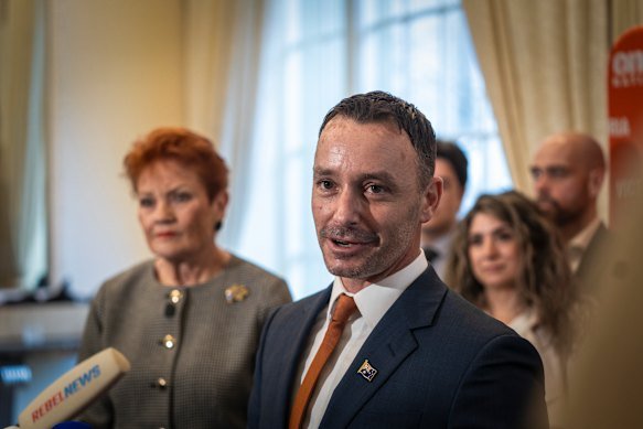 One Nation Victoria leader Warren Pickering with Pauline Hanson at a press conference in Melbourne on Monday. 