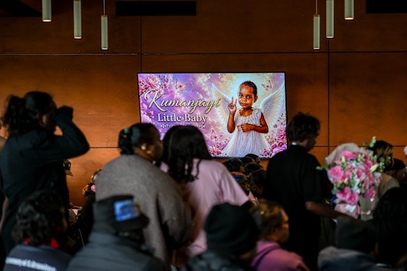 Mourners heard how Kumanjayi Little Baby loved to flash the peace sign.