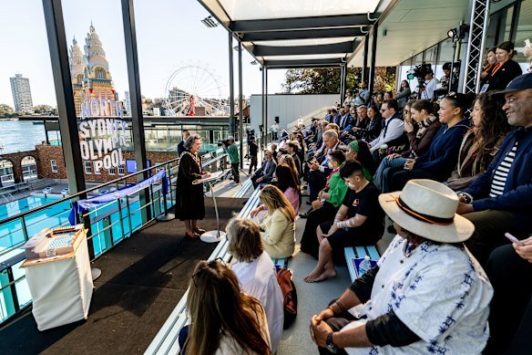 Mayor Zoe Baker addresses the crowd during the reopening of the pool.
