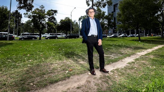 Ben Rossiter, executive officer at Victoria Walks, uses a desire path near Victoria Parade in the city.