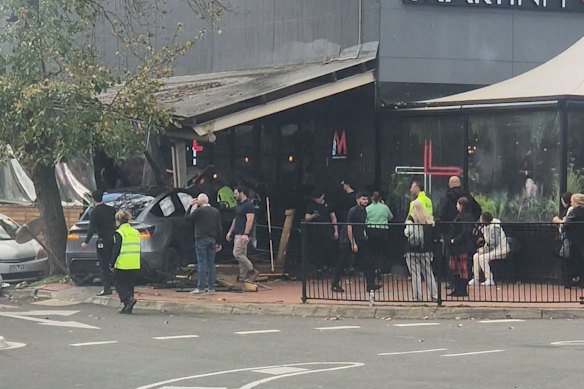 Police are investigating after a woman was killed when a car crashed into a cafe at a shopping centre in Wantirna South.