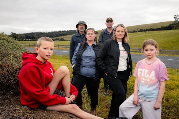 Locals Mark Trengove, Mandy Cocks, Michael Dragt and Kristy Vasils with Kristy’s children Ollie, 11, and Savannah, 9, on Staughton Vale Road at the site of Bacchus Marsh Grammar School’s proposed campus.
