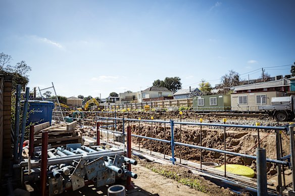 Diggers at work excavating basement car parks for the Neometro townhouse development in Brunswick.