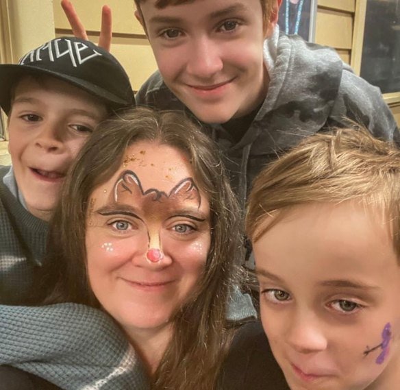 Stabbing victim Cherie Holt with her family.