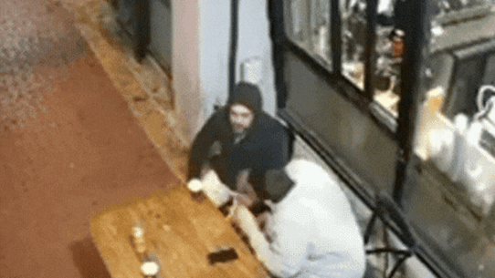 Gif of CCTV footage of August 21 2026 shooting at a cafe in Borrack Square in Altona North