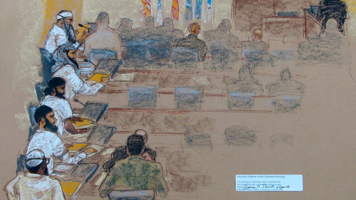 This Wednesday, Jan. 21, 2009 sketch reviewed by the U.S. military, shows, from top left, Khalid Shaikh Mohammad; Walid bin Attash; Ramzi bin al Shibh; Ali Abdul Aziz Ali, also known as Ammar al Baluchi, and Mustafa al Hawsawi attend a hearing at the U.S. Military Commissions court for war crimes at the U.S. Naval Base in Guantanamo Bay, Cuba. On Friday, Aug. 30, 2019, a military judge set Jan. 11, 2021 for the start of the long-stalled war crimes trial of the five men being held at the Guantanamo Bay prison on charges of planning and aiding the Sept. 11 terrorist attacks. (AP Photo/Janet Hamlin, Pool)